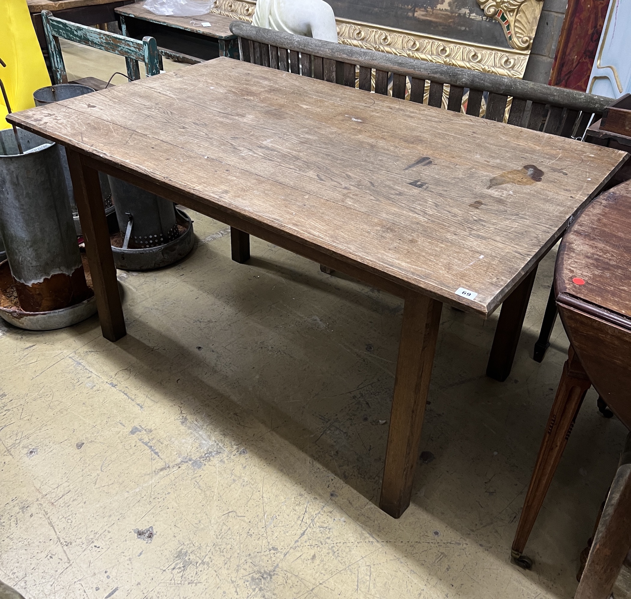 A late 19th / early 20th century French rectangular oak kitchen table, length 140cm, depth 84cm, height 74cm